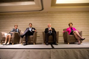Panelists (left to right) Anne Warhover, Paul Scialla, Dr. Richard Jackson, and Lynn Thurber (moderator) participate in the "Health and Development: Unlocking the Value" general session