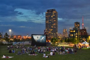 A community movie night on the south lawn at Corktown Common overlooking the downtown skyline. Credit: Nicola Betts